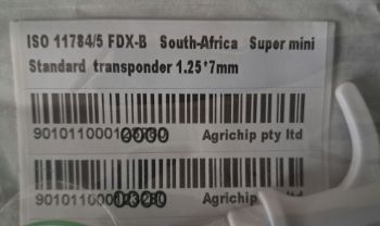 Picture of Microchip Pet SUPER Mini 1.25mm x 7mm including a pet record card.